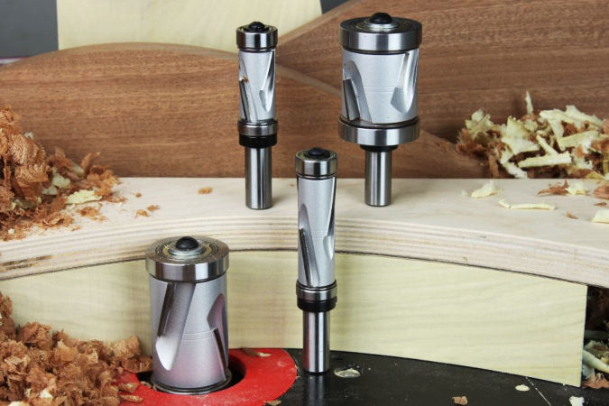 These large-diameter flush trim router bits use compression spiral cutting geometry to produce clean cuts in thick stock, figured hardwood or delicate veneers