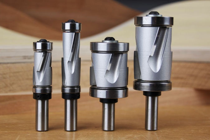 These large-diameter flush trim router bits use compression spiral cutting geometry to produce clean cuts in thick stock, figured hardwood or delicate veneers