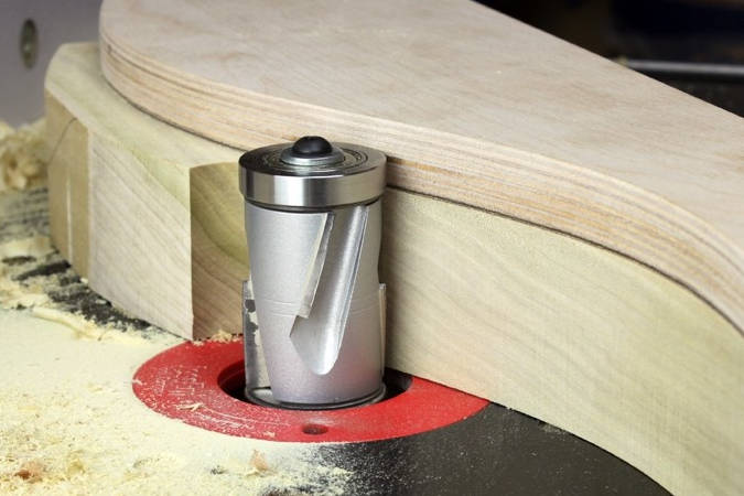 These large-diameter flush trim router bits use compression spiral cutting geometry to produce clean cuts in thick stock, figured hardwood or delicate veneers