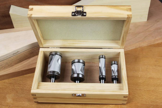 Mega Flush Trim router bit set, using compression spiral cutting geometry and large bit diameter to produce clean cuts