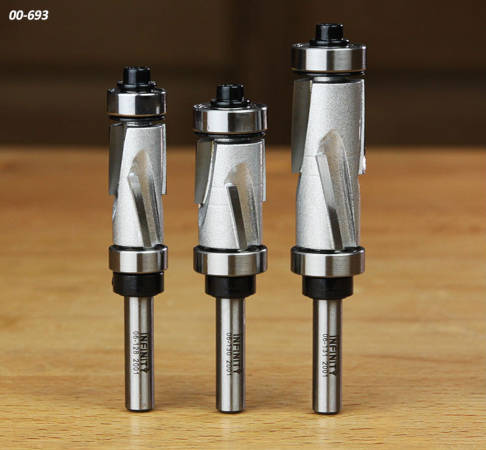 Mega Flush Trim router bit set, using compression spiral cutting geometry and large bit diameter to produce clean cuts